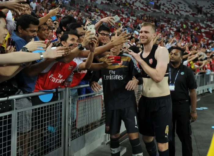 Framed Print : Arsenal's Per Mertesacker Celebrates Victory with Fans in Singapore, 2015 Framed Print : Arsenal's Per Mertesacker Celebrates Victory with Fans in Singapore, 2015