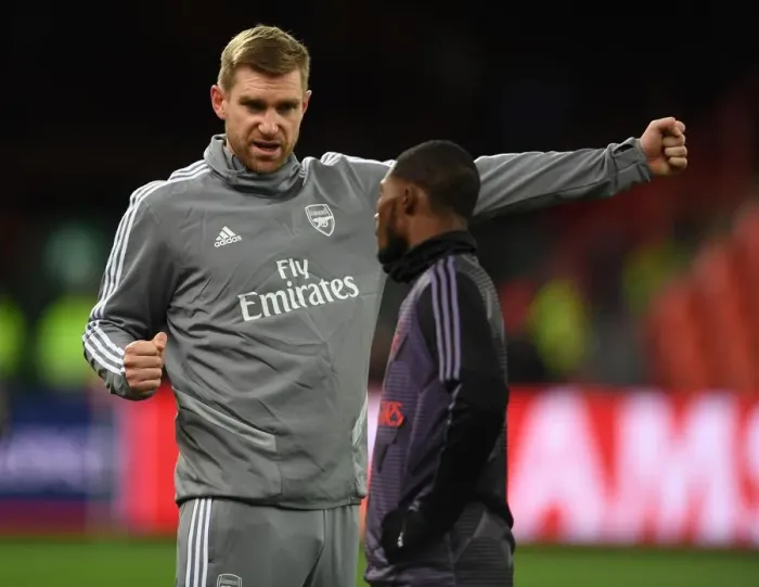 Framed Print : Arsenal's Mertesacker Coaches Maitland-Niles Ahead of Standard Liege Clash (UEFA Europa League) Framed Print : Arsenal's Mertesacker Coaches Maitland-Niles Ahead of Standard Liege Clash (UEFA Europa League)