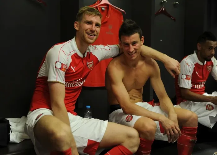 Framed Print : Arsenal's Per Mertesacker and Laurent Koscielny Celebrate Community Shield Victory over Chelsea Framed Print : Arsenal's Per Mertesacker and Laurent Koscielny Celebrate Community Shield Victory over Chelsea