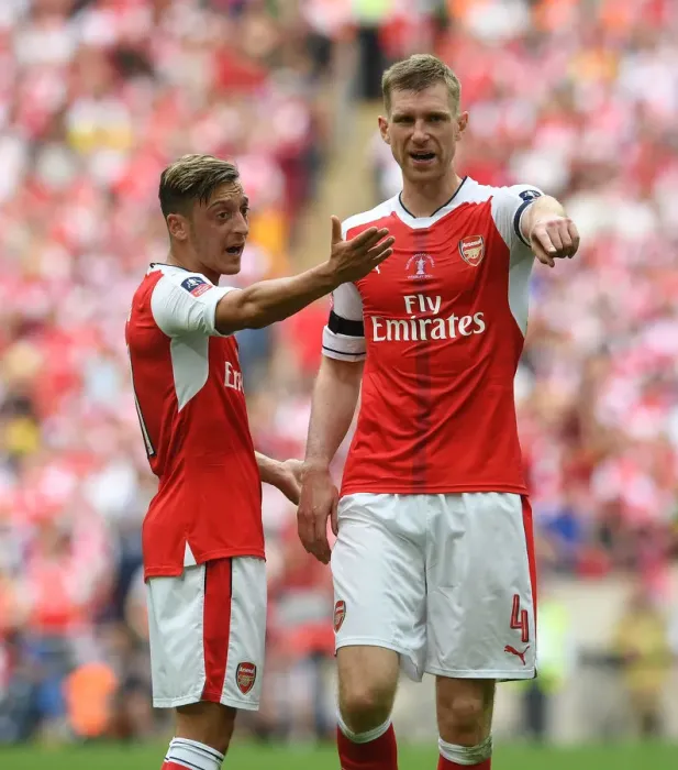 Framed Print : Arsenal's Per Mertesacker and Mesut Ozil during the FA Cup Final against Chelsea, London 2017