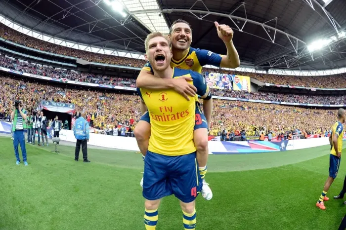 Framed Print : Arsenal's Per Mertesacker and Santi Cazorla Celebrate FA Cup Victory