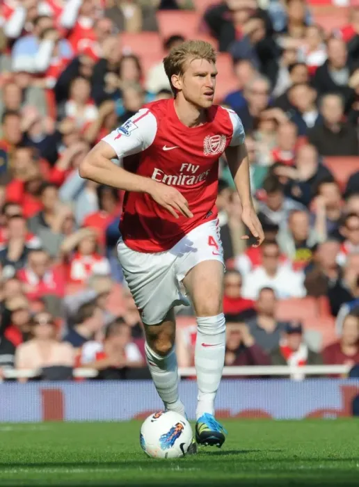 Framed Print : Arsenal's Per Mertesacker Scores in 3-1 Victory over Stoke City in the Premier League (2011) Framed Print : Arsenal's Per Mertesacker Scores in 3-1 Victory over Stoke City in the Premier League (2011)