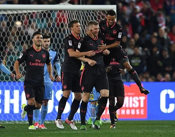 Arsenal's Per Mertesacker Scores Goal, Celebrates with Kolasinac, Bielik, and Coquelin in Sydney Friendly