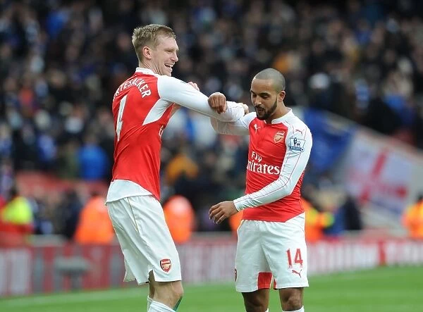 Arsenal's Per Mertesacker and Theo Walcott Celebrate Victory over Leicester City, 2016