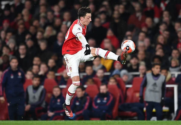 Arsenal's Mesut Ozil in Action Against Everton in the Premier League