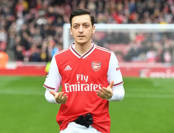 Framed Print : Arsenal's Mesut Ozil in Prayer Before Arsenal v West Ham Premier League Match