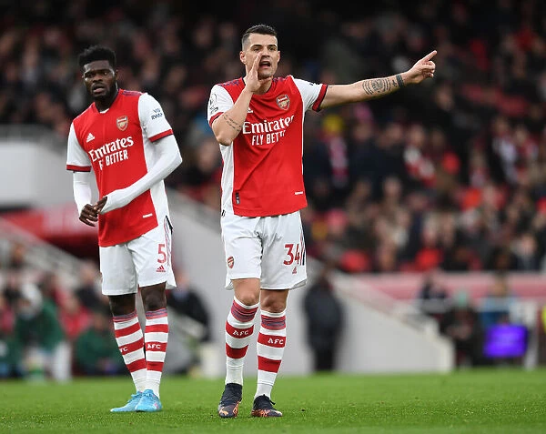 Arsenal's Midfield Duo: Partey and Xhaka in Action against Brentford, Premier League 2021-22