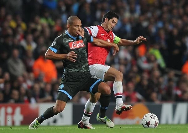 Arsenal's Midfield Showdown: Arteta vs. Inler in the Champions League Clash Against Napoli