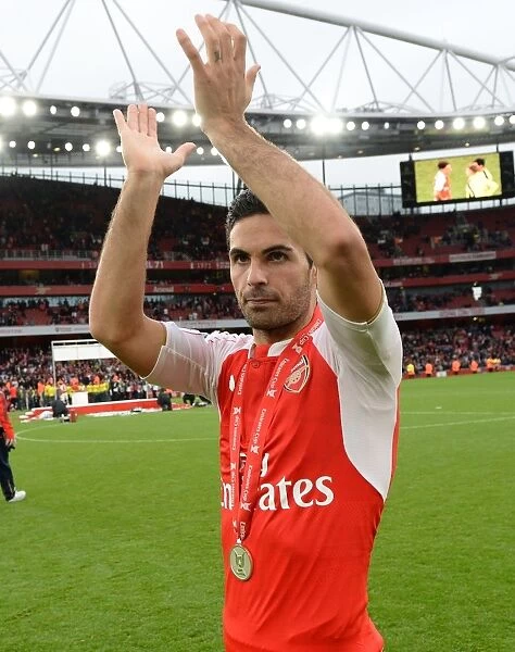 Arsenal's Mikel Arteta Celebrates Emirates Cup Victory with Fans