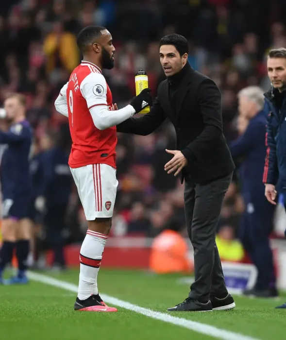 Framed Print : Arsenal's Mikel Arteta Coaches Alexis Lacazette Amid Intense Arsenal v West Ham United Clash (2019-20) Framed Print : Arsenal's Mikel Arteta Coaches Alexis Lacazette Amid Intense Arsenal v West Ham United Clash (2019-20)