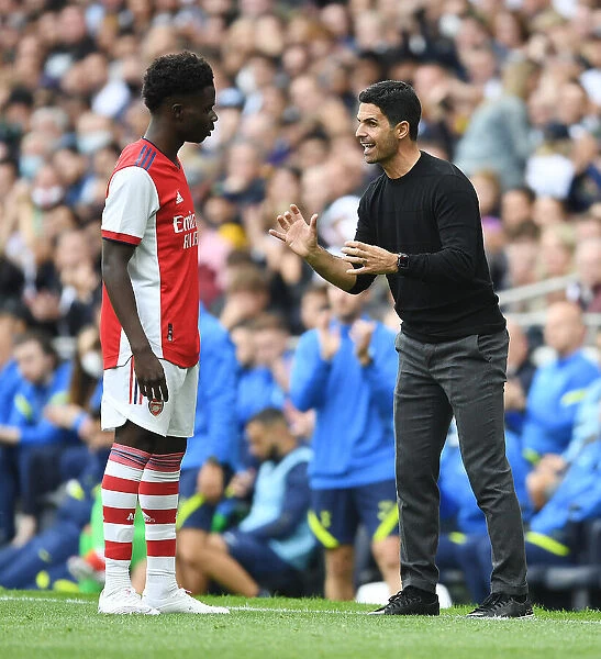 Arsenal's Mikel Arteta Coaches Bukayo Saka During Tottenham-Arsenal Pre-Season Clash