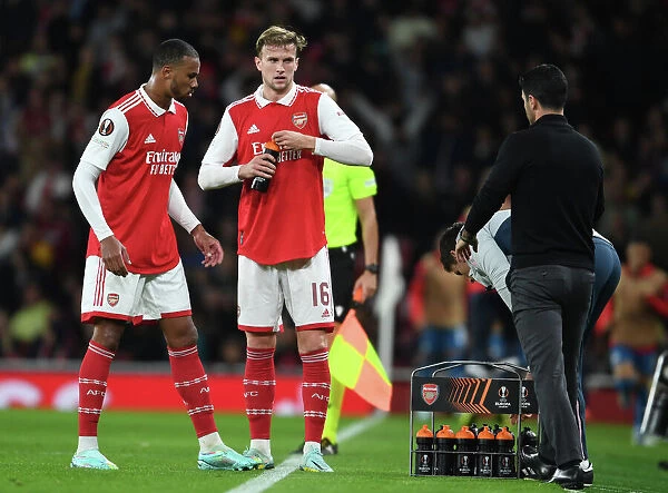 Arsenal's Mikel Arteta Consoles Gabriel and Rob Holding During Europa League Match vs. PSV Eindhoven