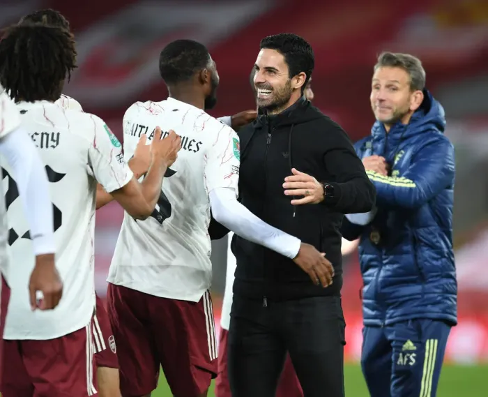 Framed Print : Arsenal's Mikel Arteta Embraces Ainsley Maitland-Niles in Empty Anfield: Carabao Cup Showdown Between Liverpool and Arsenal, 2020-21 Framed Print : Arsenal's Mikel Arteta Embraces Ainsley Maitland-Niles in Empty Anfield: Carabao Cup Showdown Between Liverpool and Arsenal, 2020-21