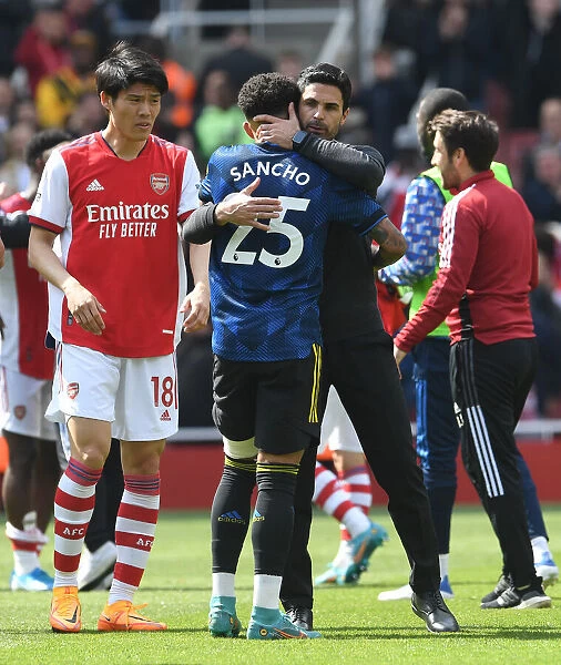 Arsenal's Mikel Arteta Embraces Jadon Sancho in Intense Arsenal v Manchester United Clash (2021-22)
