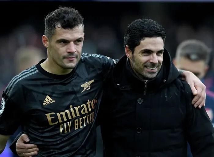 Framed Print : Arsenal's Mikel Arteta and Granit Xhaka Celebrate Victory over Fulham in Premier League 2022-23 Framed Print : Arsenal's Mikel Arteta and Granit Xhaka Celebrate Victory over Fulham in Premier League 2022-23