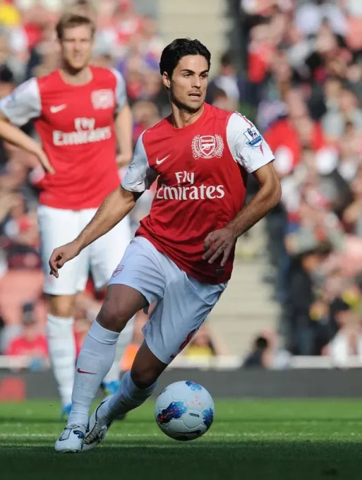 Framed Print : Arsenal's Mikel Arteta Leads the Way: 3-1 Victory Over Stoke City in the Premier League (2011-2012)