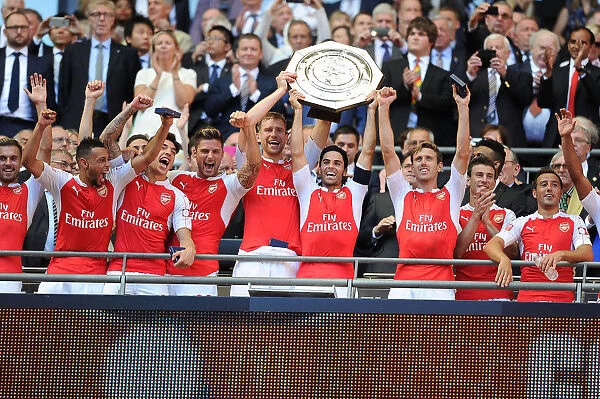 Arsenal's Mikel Arteta and Per Mertesacker Celebrate Community Shield Victory over Chelsea (2015)