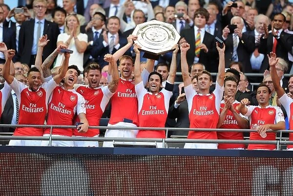 Arsenal's Mikel Arteta and Per Mertesacker Celebrate Community Shield Victory over Chelsea (2015-16)