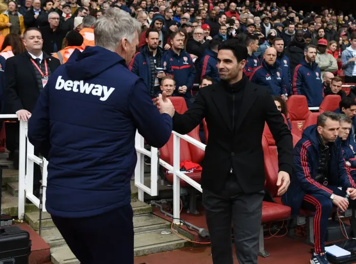 Framed Print : Arsenal's Mikel Arteta and West Ham's David Moyes Pre-Match Handshake - Premier League Showdown at Emirates Stadium Framed Print : Arsenal's Mikel Arteta and West Ham's David Moyes Pre-Match Handshake - Premier League Showdown at Emirates Stadium
