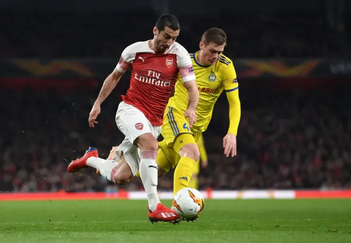 Framed Print : Arsenal's Mkhitaryan Clashes with BATE's Filipovic in Europa League Showdown