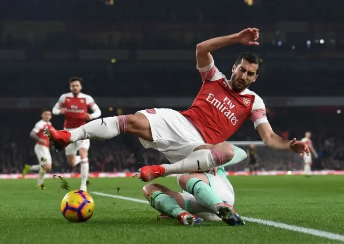 Framed Print : Arsenal's Mkhitaryan Clashes with Bournemouth's Smith in Premier League Showdown