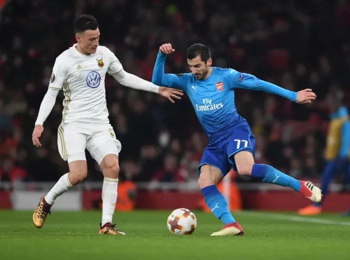 Framed Print : Arsenal's Mkhitaryan Clashes with Östersunds Hopcutt in Europa League Showdown Framed Print : Arsenal's Mkhitaryan Clashes with Östersunds Hopcutt in Europa League Showdown