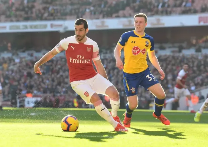 Framed Print : Arsenal's Mkhitaryan Clashes with Southampton's Targett in Premier League Showdown Framed Print : Arsenal's Mkhitaryan Clashes with Southampton's Targett in Premier League Showdown