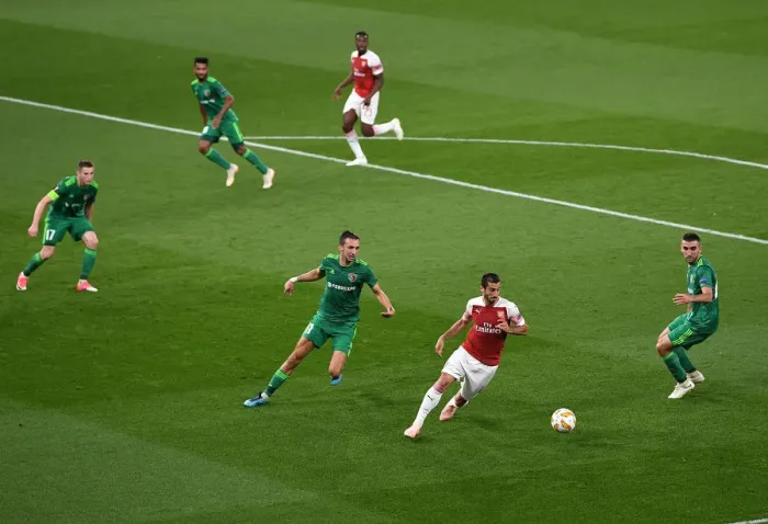 Framed Print : Arsenal's Mkhitaryan Clashes with Vorskla's Sharpar in Europa League Clash