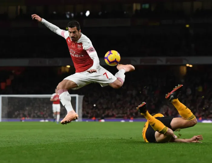 Framed Print : Arsenal's Mkhitaryan Clashes with Wolves Bennett in Premier League Showdown