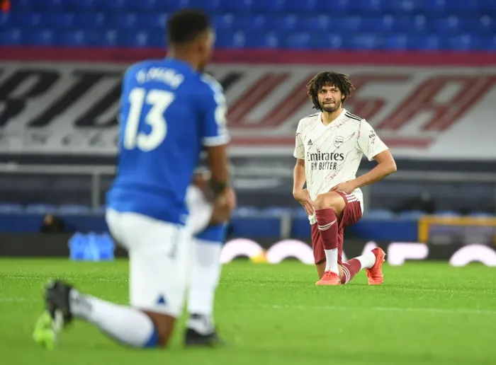Framed Print : Arsenal's Mo Elneny Kneels Before Everton Match, Premier League 2020-21 Framed Print : Arsenal's Mo Elneny Kneels Before Everton Match, Premier League 2020-21