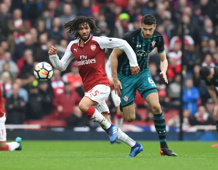 Framed Print : Arsenal's Mo Elneny Outmaneuvers Southampton's Wesley Hoedt