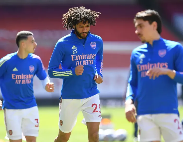 Framed Print : Arsenal's Mohamed Elneny Prepares for Fulham Clash at Empty Emirates Stadium (Arsenal v Fulham, 2021-22 Premier League)