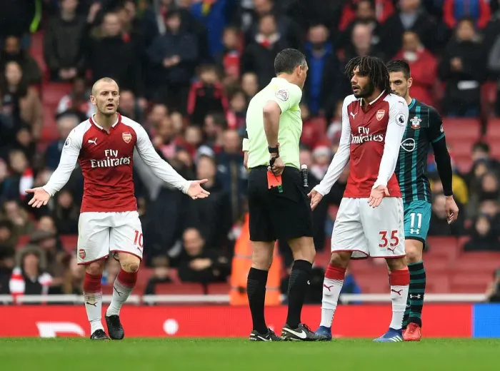 Framed Print : Arsenal's Mohamed Elneny Red-Carded by Referee Andre Marriner in Premier League Match against Southampton