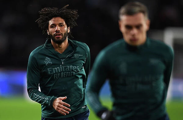 Arsenal's Mohamed Elneny Warms Up Ahead of PSV Eindhoven Clash in 2023-24 UEFA Champions League
