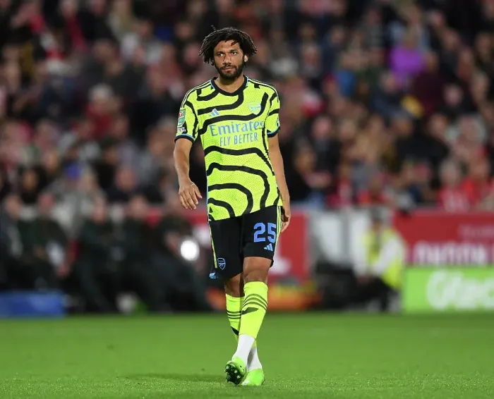 Framed Print : Arsenal's Mohamed Elneny Watches Brentford-Arsenal Carabao Cup Clash, 2023-24 Framed Print : Arsenal's Mohamed Elneny Watches Brentford-Arsenal Carabao Cup Clash, 2023-24