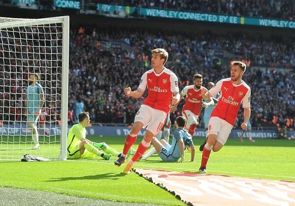 Arsenal's Monreal and Ramsey Celebrate Goal in FA Cup Semi-Final vs. Manchester City