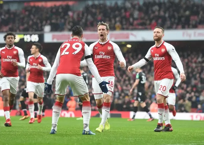 Framed Print : Arsenal's Monreal, Xhaka, and Mustafi Celebrate Goal Against Crystal Palace (2018)