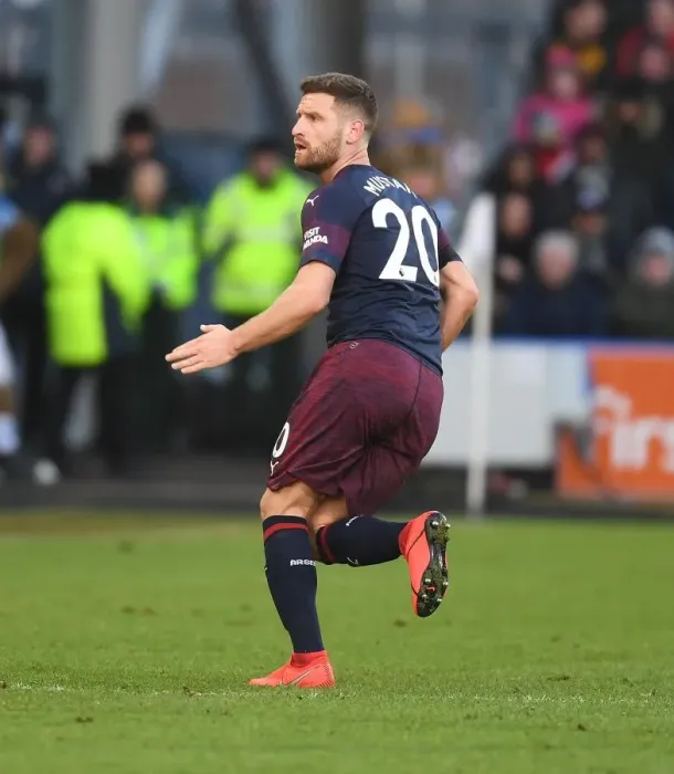 Framed Print : Arsenal's Mustafi in Action: Premier League Showdown vs. Huddersfield