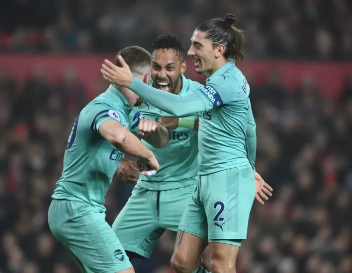 Framed Print : Arsenal's Mustafi, Aubameyang, and Bellerin Celebrate Goal Against Manchester United (2018-19)