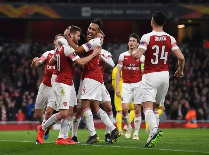 Framed Print : Arsenal's Mustafi and Aubameyang Celebrate Goals in Europa League Victory over BATE Borisov