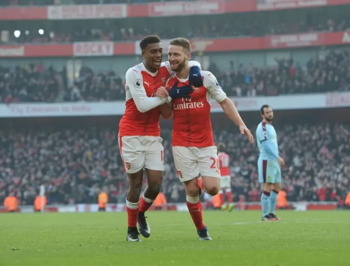 Framed Print : Arsenal's Mustafi and Iwobi Celebrate Goal Against Burnley (2016-17) Framed Print : Arsenal's Mustafi and Iwobi Celebrate Goal Against Burnley (2016-17)