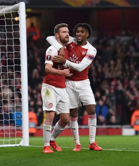 Framed Print : Arsenal's Mustafi and Iwobi Celebrate Goals Against BATE Borisov in Europa League