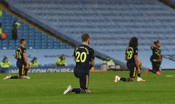 Arsenal's Mustafi Kneels in Solidarity: Manchester City vs. Arsenal, Premier League 2019-20