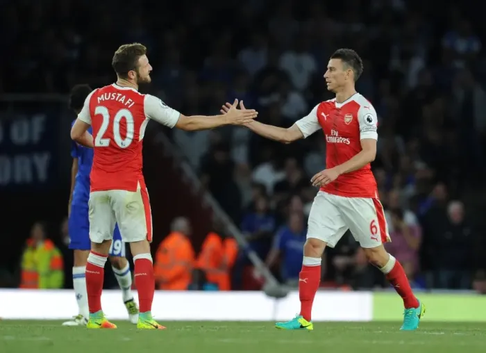 Framed Print : Arsenal's Mustafi and Koscielny in Action: Arsenal vs. Chelsea (2016-17)