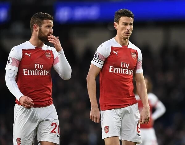 Arsenal's Mustafi and Koscielny Face Off Against Manchester City in Premier League Clash (2018-19)