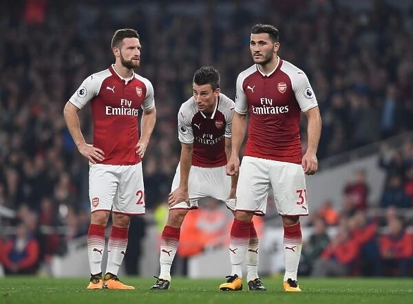 Arsenal's Mustafi, Koscielny, and Kolasinac in Action against West Bromwich Albion (2017-18)