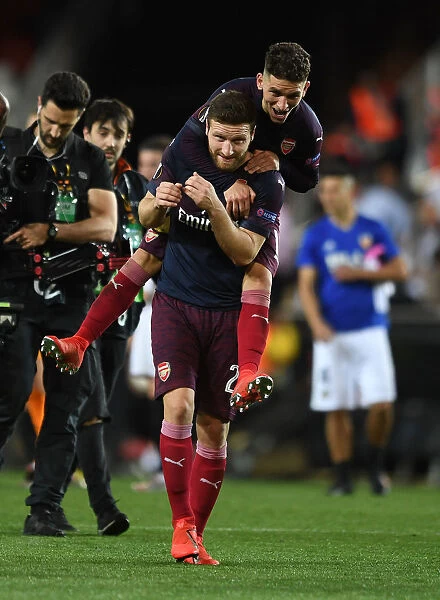 Arsenal's Mustafi and Torreira Celebrate Europa League Semi-Final Victory over Valencia