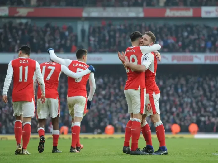 Framed Print : Arsenal's Mustafi and Xhaka Celebrate First Goal Against Burnley (2016-17)