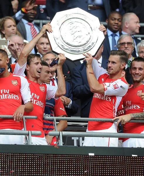 Arsenal's Nacho Monreal and Aaron Ramsey Celebrate FA Community Shield Victory over Manchester City