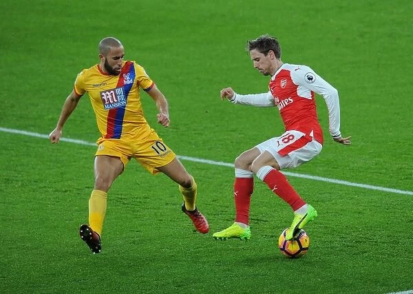 Arsenal's Nacho Monreal Clashes with Crystal Palace's Andros Townsend in Premier League Showdown